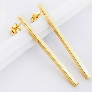 1.25" .925 sterling silver 24k gold vermeil stick earrings: nwot